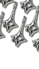 Load image into Gallery viewer, Silver star-shaped charms on a white background
