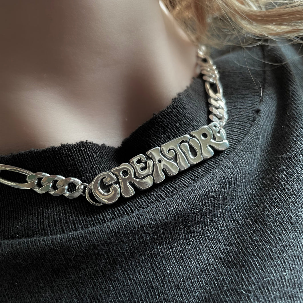 CREATURE medallion with lg figaro chain